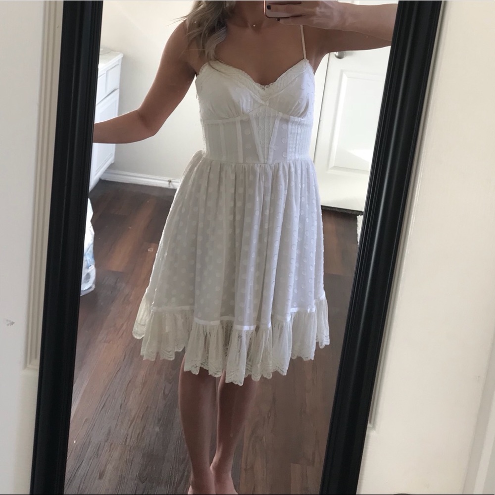 Beautiful white/ivory corset style Bebe dress